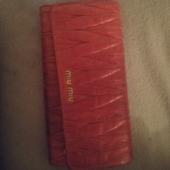 Miu Miu Handbags - Long pink gold Miu Mui prada clutch leather wallet